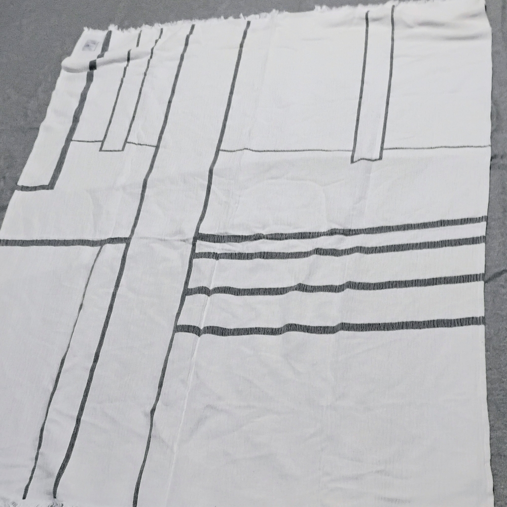 White and Black Geometric Patterned Fabri